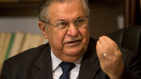 Iraq's President Jalal Talabani speaks during an interview with Reuters in Baghdad in this August 25, 2009 picture - Sputnik International