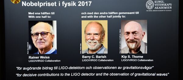 Laureates (L-R) Rainer Weiss, Barry C Barish and Kip S Thorne are pictured on a display during the announcement of the 2017 Nobel Prize winners in Physics on October 3, 2017, at the Royal Swedish Academy of Sciences in Stockholm Laureates (L-R) Rainer Weiss, Barry C Barish and Kip S Thorne are pictured on a display during the announcement of the 2017 Nobel Prize winners in Physics on October 3, 2017, at the Royal Swedish Academy of Sciences in Stockholm - Sputnik International