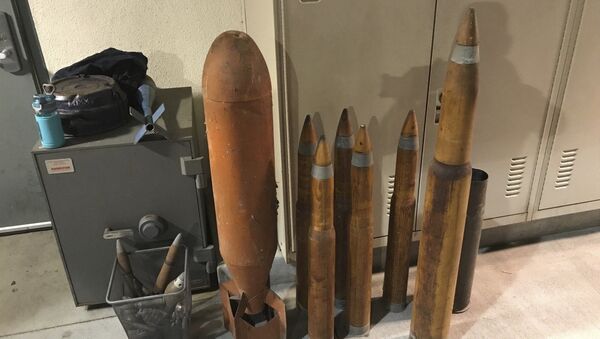 This photo provided by the Los Angeles County Sheriff's Department taken on Friday, Sept. 29, 2017 shows a cache of old military-grade explosives that were found in the backyard of a Los Angeles-area home on Thursday, Sept. 28. - Sputnik International