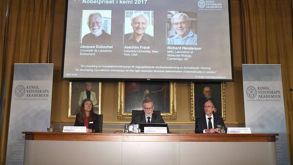 Gunnar von Heijne (C), Secretary of the Nobel Committee for Chemistry 2017, Sara Snogerup Linse, Chair of the Nobel Committee for Chemistry 2017 and Peter Brzezinski, Professor of Biochemistry, announce the winners of the 2017 Nobel Prize in Chemistry during a press conference in Stockholm, Sweden, October 4, 2017 - Sputnik International