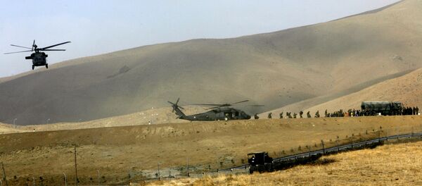 A Turkish military chopper, moving soldiers to the frontier, lands in a mountainous district of Yuksekova, in the Hakkari province, near the Turkish-Iraqi-Iranian border, southeastern Turkey (File) A Turkish military chopper, moving soldiers to the frontier, lands in a mountainous district of Yuksekova, in the Hakkari province, near the Turkish-Iraqi-Iranian border, southeastern Turkey (File) - Sputnik International