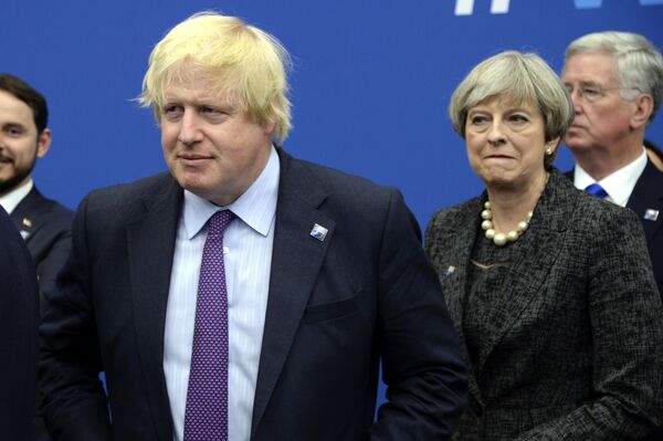 British Foreign Secretary Boris Johnson, left and Britain's Prime Minister Theresa May arrive for a meeting during the NATO summit of heads of state and government, at the NATO headquarters, in Brussels on Thursday, May 25, 2017. British Foreign Secretary Boris Johnson, left and Britain's Prime Minister Theresa May arrive for a meeting during the NATO summit of heads of state and government, at the NATO headquarters, in Brussels on Thursday, May 25, 2017. - Sputnik International