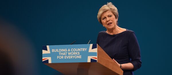 Britain's Prime Minister Theresa May delivers her speech on the final day of the Conservative Party annual conference at the Manchester Central Convention Centre in Manchester, northwest England - Sputnik International