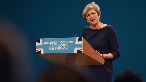 Britain's Prime Minister Theresa May delivers her speech on the final day of the Conservative Party annual conference at the Manchester Central Convention Centre in Manchester, northwest England - Sputnik International