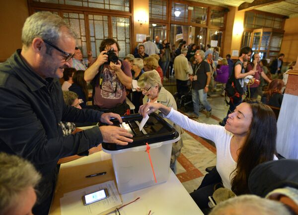Voting at a polling station in Barcelona during a referendum on Catalonia's independence. File photo Voting at a polling station in Barcelona during a referendum on Catalonia's independence. File photo - Sputnik International