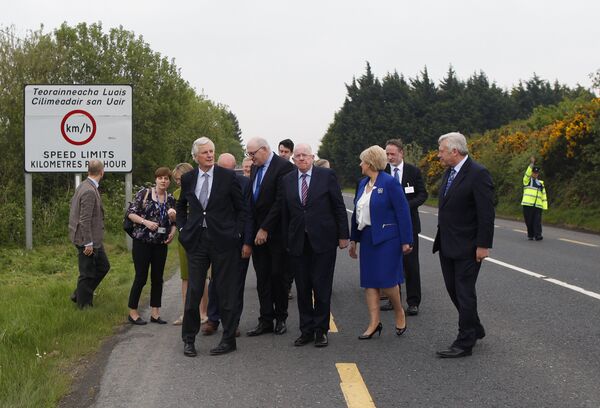 The European Union's chief negotiator Michel Barnier, front left, and Charles Flanagan, center, Minister for Foreign Affairs walk along the Irish border close to Castleblayney, Ireland, Friday, May 12, 2017. The European Union's chief negotiator Michel Barnier, front left, and Charles Flanagan, center, Minister for Foreign Affairs walk along the Irish border close to Castleblayney, Ireland, Friday, May 12, 2017. - Sputnik International