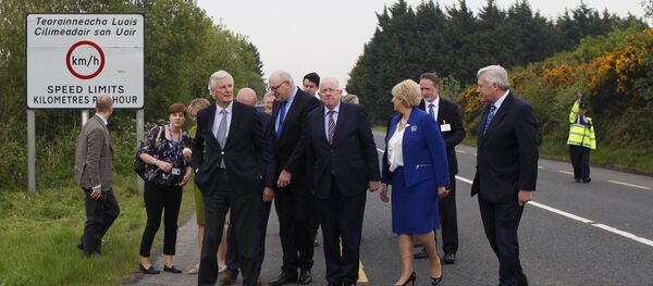 The European Union's chief negotiator Michel Barnier, front left, and Charles Flanagan, center, Minister for Foreign Affairs walk along the Irish border close to Castleblayney, Ireland, Friday, May 12, 2017. The European Union's chief negotiator Michel Barnier, front left, and Charles Flanagan, center, Minister for Foreign Affairs walk along the Irish border close to Castleblayney, Ireland, Friday, May 12, 2017. - Sputnik International