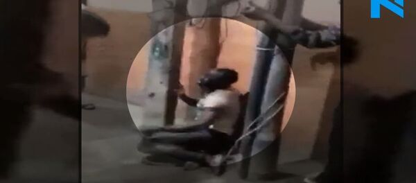 Nigerian tied to post, brutally thrashed by mob in Delhi Nigerian tied to post, brutally thrashed by mob in Delhi - Sputnik International