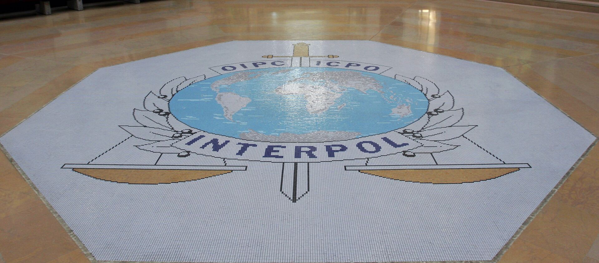 This Oct.16, 2007 file photo shows the entrance hall of Interpol's headquarters in Lyon, central France - Sputnik International, 1920, 23.02.2021