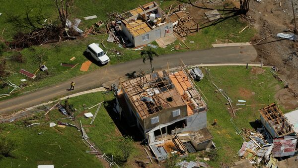 Damaged homes are seen as recovery efforts continue following Hurricane Maria near Ciales, Puerto Rico, October 7, 2017 - Sputnik International