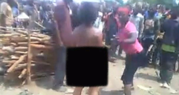 Footage from the rape and execution of a woman in the Democratic Republic of the Congo. The woman, along with her step-son, were killed for serving Kamwina Nsapu anti-government militants the forbidden food of fish. - Sputnik International