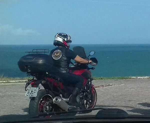 Gean Neide Andrade with her bike, of which she traveled through 28 countries, crossing all the Americas, various parts of Europe and Russia - Sputnik International