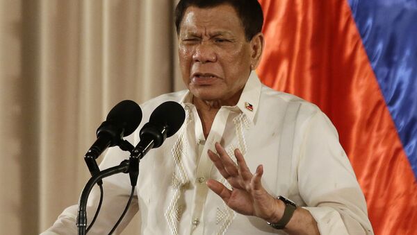 In this Aug. 16, 2017, photo, Philippine President Rodrigo Duterte gestures during the 19th Founding Anniversary of the Volunteers Against Crime and Corruption at the Malacanang Presidential Palace in Manila, Philippines. - Sputnik International