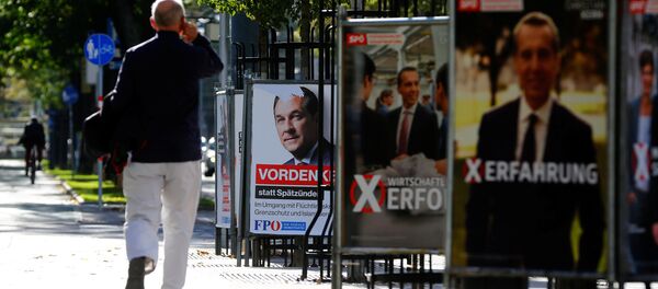 A man walks past an election campaign posters of top candidate of Social Democratic Party of Austria (SPOe) and Austrian Chancellor Christian Kern and far-right Freedom Party of Austria (FPOe) head and top candidate Heinz-Christian Strache in Vienna, Austria, October 5, 2017 A man walks past an election campaign posters of top candidate of Social Democratic Party of Austria (SPOe) and Austrian Chancellor Christian Kern and far-right Freedom Party of Austria (FPOe) head and top candidate Heinz-Christian Strache in Vienna, Austria, October 5, 2017 - Sputnik International