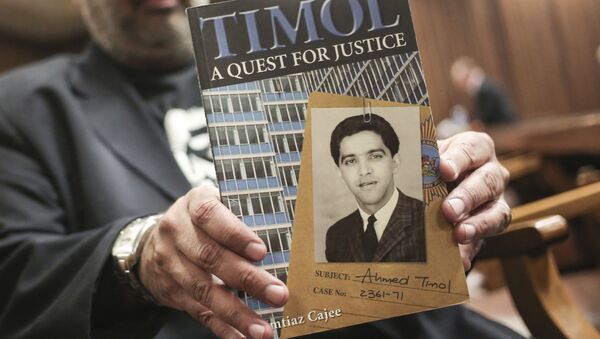 In this Thursday, Aug. 24, 2017 file photo, Imtiaz Cajee, nephew of Ahmed Timol, poses with his book Timol, A Quest for Justice in the North Gauteng High court in Pretoria, South Africa. - Sputnik International