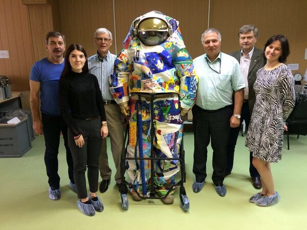 The unusual spacesuit, named Victory, hand-painted by cancer patients in Russia and the United States. The unusual spacesuit, named Victory, hand-painted by cancer patients in Russia and the United States. - Sputnik International