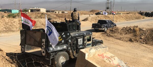 Members of Iraqi federal forces are seen near the oil fields in Kirkuk, Iraq October 16, 2017 - Sputnik International