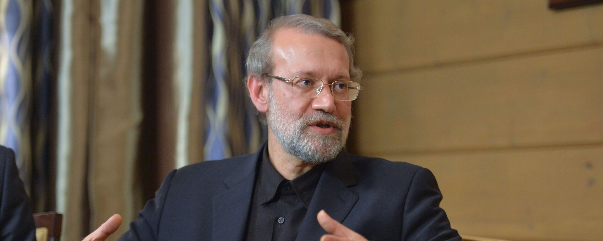 Speaker of the Islamic Consultative Council (parliament) of the Islamic Republic of Iran Ali Larijani during a meeting with Russian President Vladimir Putin following the 12th annual meeting of the Valdai International Discussion Club. File photo - Sputnik International, 1920, 18.03.2026