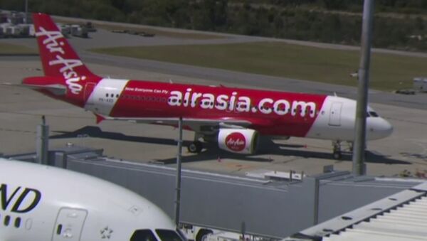 This Sunday, Oct. 15, 2017 image made from video shows an AirAsia plane at an airport in Perth, Australia. - Sputnik International