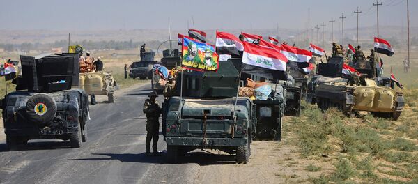 Members of Iraqi federal forces gather to continue to advance in military vehicles in Kirkuk, Iraq October 16, 2017. Members of Iraqi federal forces gather to continue to advance in military vehicles in Kirkuk, Iraq October 16, 2017. - Sputnik International