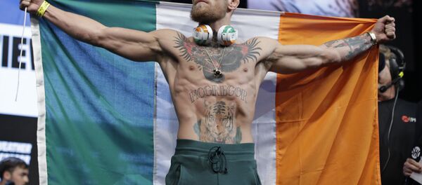 Conor McGregor stands on stage during a weigh-in Friday, Aug. 25, 2017, in Las Vegas. - Sputnik International