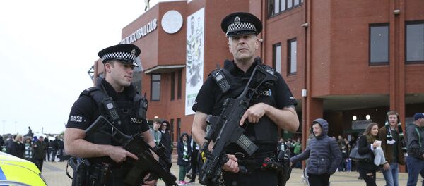 Armed police outside Celtic Park prior to the Scottish Premiership soccer match at Celtic Park in Glasgow, Scotland, Saturday Sept. 16, 2017 - Sputnik International