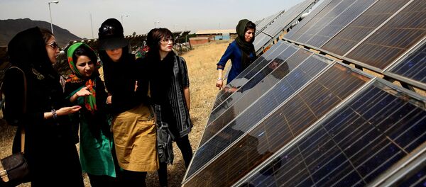 In this June, 22, 2014 photo, Iranian students tour the Taleghan Renewable Energy Site in Taleghan,160 kilometers (99 miles) northwest of capital Tehran, Iran In this June, 22, 2014 photo, Iranian students tour the Taleghan Renewable Energy Site in Taleghan,160 kilometers (99 miles) northwest of capital Tehran, Iran - Sputnik International