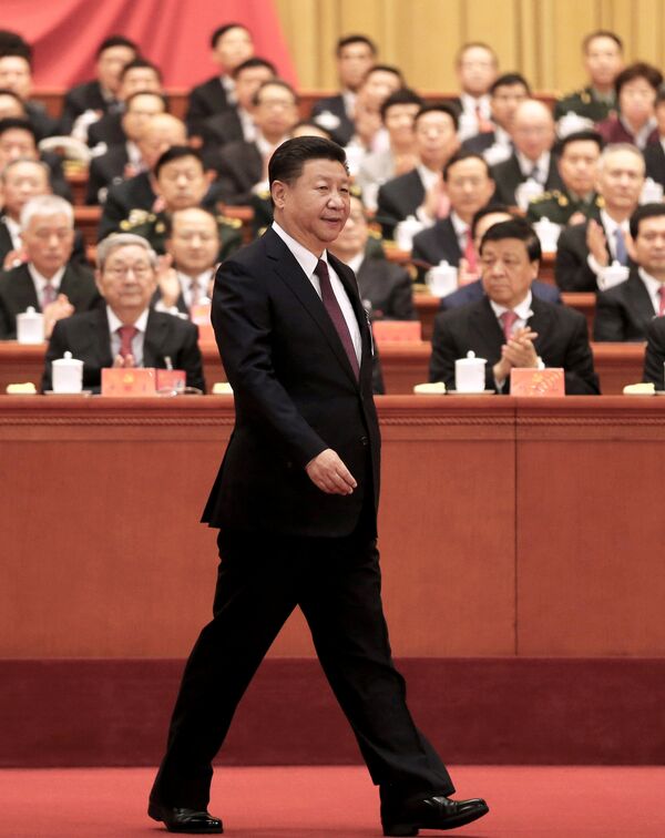 Chinese President Xi Jinping walks to the lectern to deliver his speech during the opening session of the 19th National Congress of the Communist Party of China at the Great Hall of the People in Beijing, China October 18, 2017. Chinese President Xi Jinping walks to the lectern to deliver his speech during the opening session of the 19th National Congress of the Communist Party of China at the Great Hall of the People in Beijing, China October 18, 2017. - Sputnik International