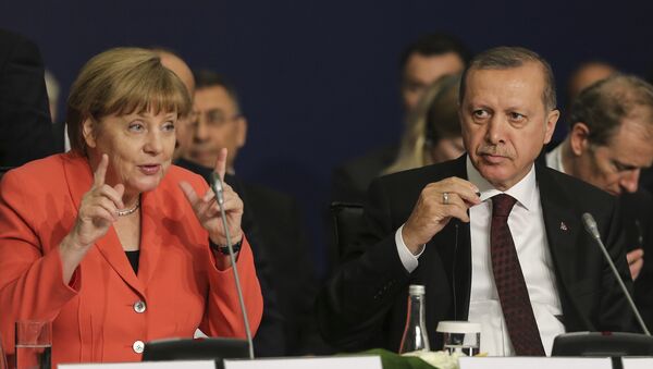 German Chancellor Angela Merkel, left, talks as Turkey's President Recep Tayyip Erdogan listens during a roundtable meeting on Political Leadership to Prevent and End Conflicts at the World Humanitarian Summit in Istanbul, Monday, May 23, 2016 - Sputnik International