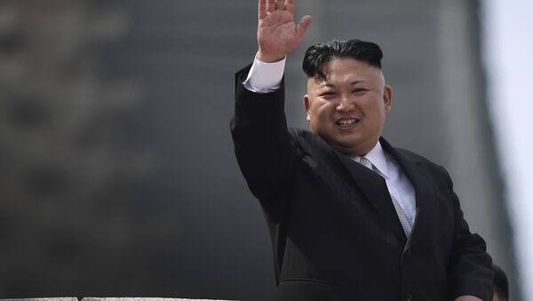 North Korean leader Kim Jong Un waves during a military parade on Saturday, April 15, 2017, in Pyongyang, North Korea to celebrate the 105th birth anniversary of Kim Il Sung, the country's late founder and grandfather of current ruler Kim Jong Un. - Sputnik International