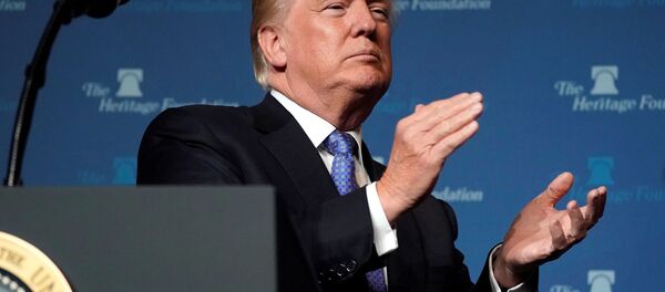 US President Donald Trump claps before speaking at the Heritage Foundation’s President’s Club Meeting in Washington, US, October 17, 2017. - Sputnik International