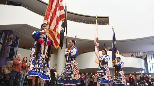 Native American Women Warriors, from left, Takara Matthews (Sokoki Abenaki/Lumbee) Jamie Awonohopay (Menominee), Elizabeth Haas (Northern Arapaho Tribe), Antonia Thomas (Navajo), all veterans of the U.S. Armed Forces, take part in the Presentation of the Colors during a Veterans Day celebration at Smithsonian's National Museum of the American Indian on Friday, Nov. 11, 2016 in Washington - Sputnik International