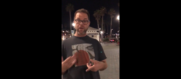 Anthony Miskulin harasses lesbian couple walking on California's Huntington Beach Pier Anthony Miskulin harasses lesbian couple walking on California's Huntington Beach Pier - Sputnik International
