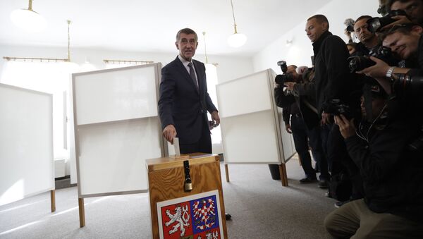 Czech billionaire and leader of the ANO 2011 political movement Andrej Babis casts his vote during the parliamentary elections in Pruhonice, Czech Republic, Friday, Oct. 20, 2017 - Sputnik International