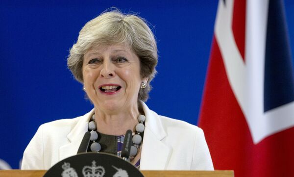 British Prime Minister Theresa May Theresa May speaks during a media conference at an EU summit in Brussels on Friday, Oct. 20, 2017. - Sputnik International