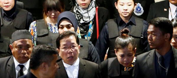 Indonesian Siti Aisyah and Vietnamese Doan Thi Huong, who are on trial for the killing of Kim Jong Nam, the estranged half-brother of North Korea's leader, are escorted as they revisit the Kuala Lumpur International Airport 2 in Sepang, Malaysia October 24, 2017. Indonesian Siti Aisyah and Vietnamese Doan Thi Huong, who are on trial for the killing of Kim Jong Nam, the estranged half-brother of North Korea's leader, are escorted as they revisit the Kuala Lumpur International Airport 2 in Sepang, Malaysia October 24, 2017. - Sputnik International