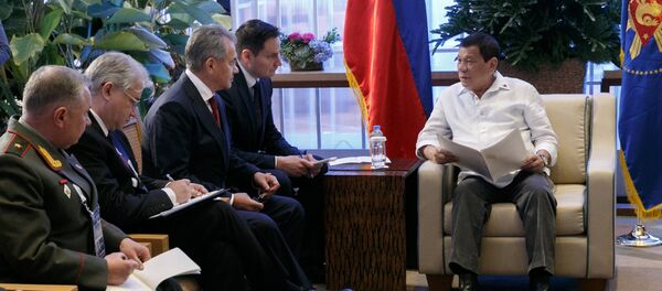 Russian Defense Minster Sergei Shoigu, third left, during a meeting with President of the Philippines Rodrigo Duterte, right, in the Philippines Russian Defense Minster Sergei Shoigu, third left, during a meeting with President of the Philippines Rodrigo Duterte, right, in the Philippines - Sputnik International