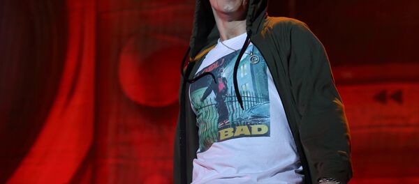 Eminem performs at Lollapalooza in Chicago's Grant Park on Friday, Aug. 1, 2014. Eminem performs at Lollapalooza in Chicago's Grant Park on Friday, Aug. 1, 2014. - Sputnik International