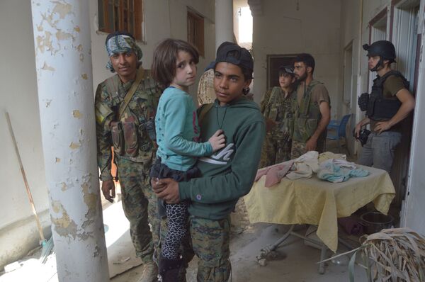 Residents of the liberated Raqqa province. File photo Residents of the liberated Raqqa province. File photo - Sputnik International