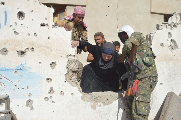 Residents of the liberated Raqqa province. File photo Residents of the liberated Raqqa province. File photo - Sputnik International
