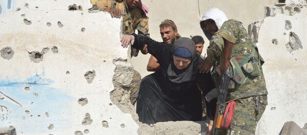 Residents of the liberated Raqqa province. File photo Residents of the liberated Raqqa province. File photo - Sputnik International