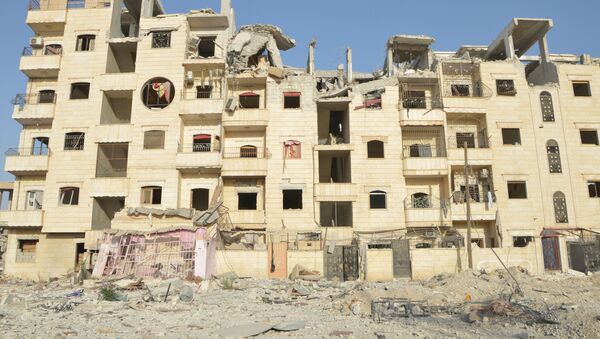 Damaged building of the liberated Al-Raqqah Province - Sputnik International