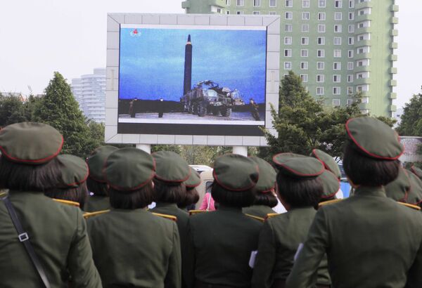 People fill the square of the main railway station to watch a televised news broadcast of the test-fire of an inter-continental ballistic rocket Hwasong-12, Wednesday, August 30, 2017, in Pyongyang, North Korea People fill the square of the main railway station to watch a televised news broadcast of the test-fire of an inter-continental ballistic rocket Hwasong-12, Wednesday, August 30, 2017, in Pyongyang, North Korea - Sputnik International