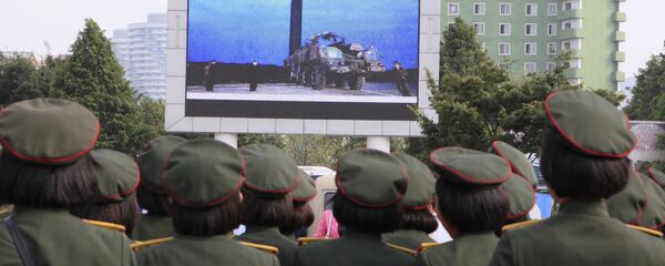 People fill the square of the main railway station to watch a televised news broadcast of the test-fire of an inter-continental ballistic rocket Hwasong-12, Wednesday, August 30, 2017, in Pyongyang, North Korea People fill the square of the main railway station to watch a televised news broadcast of the test-fire of an inter-continental ballistic rocket Hwasong-12, Wednesday, August 30, 2017, in Pyongyang, North Korea - Sputnik International