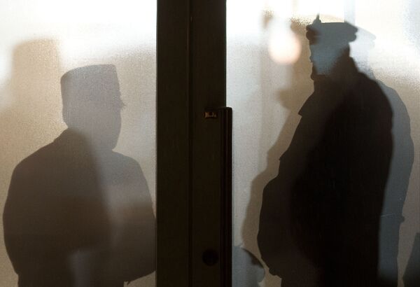 Devotees follow a speech by the head of the Ahmadiyya Muslim Jamaat Community at the Bait-ul-Rasheed Mosque in Hamburg, northern Germany on December 5, 2012 Devotees follow a speech by the head of the Ahmadiyya Muslim Jamaat Community at the Bait-ul-Rasheed Mosque in Hamburg, northern Germany on December 5, 2012 - Sputnik International