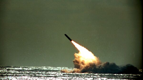 Dec. 4, 1989 file photo shows the launch of a Trident II, D-5 missile from the submerged USS Tennessee submarine in the Atlantic Ocean off the coast of Florida. As of mid-2010, 12 operational U.S. nuclear-missile submarines carry a total of 288 Trident missiles. A movement is growing worldwide to abolish nuclear weapons, encouraged by President Barack Obama's endorsement of that goal. But realists argue that more stability and peace must first be achieved in the world. - Sputnik International