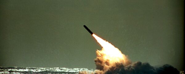 Dec. 4, 1989 file photo shows the launch of a Trident II, D-5 missile from the submerged USS Tennessee submarine in the Atlantic Ocean off the coast of Florida. As of mid-2010, 12 operational U.S. nuclear-missile submarines carry a total of 288 Trident missiles. A movement is growing worldwide to abolish nuclear weapons, encouraged by President Barack Obama's endorsement of that goal. But realists argue that more stability and peace must first be achieved in the world. - Sputnik International