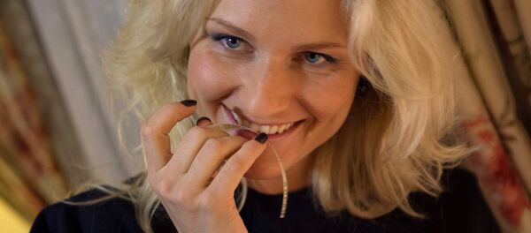 TV presenter and singer Katya Gordon at the presentation of a new Abrau-Dyurso perfume in Moscow. (File) TV presenter and singer Katya Gordon at the presentation of a new Abrau-Dyurso perfume in Moscow. (File) - Sputnik International