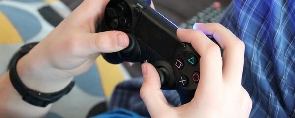 Playing video games - Sputnik International