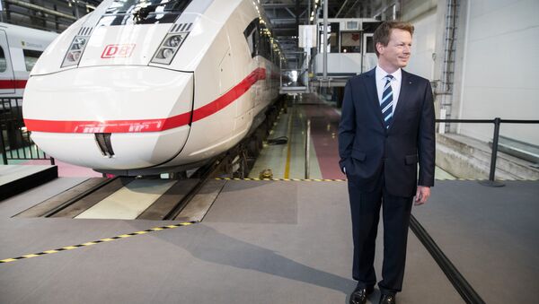 Richard Lutz, CEO of the German railway operator Deutsche Bahn (DB) poses for a picture in front of an Inter City Express 4 train prior to the company's annual results news conference in Berlin on March 23, 2017. - Sputnik International